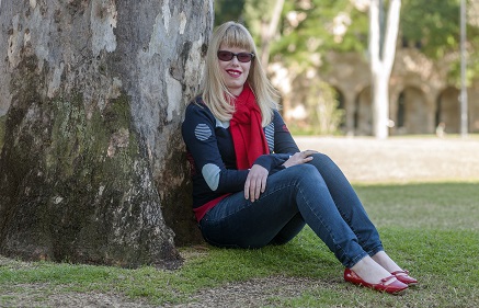 Jane sitting down against a tree