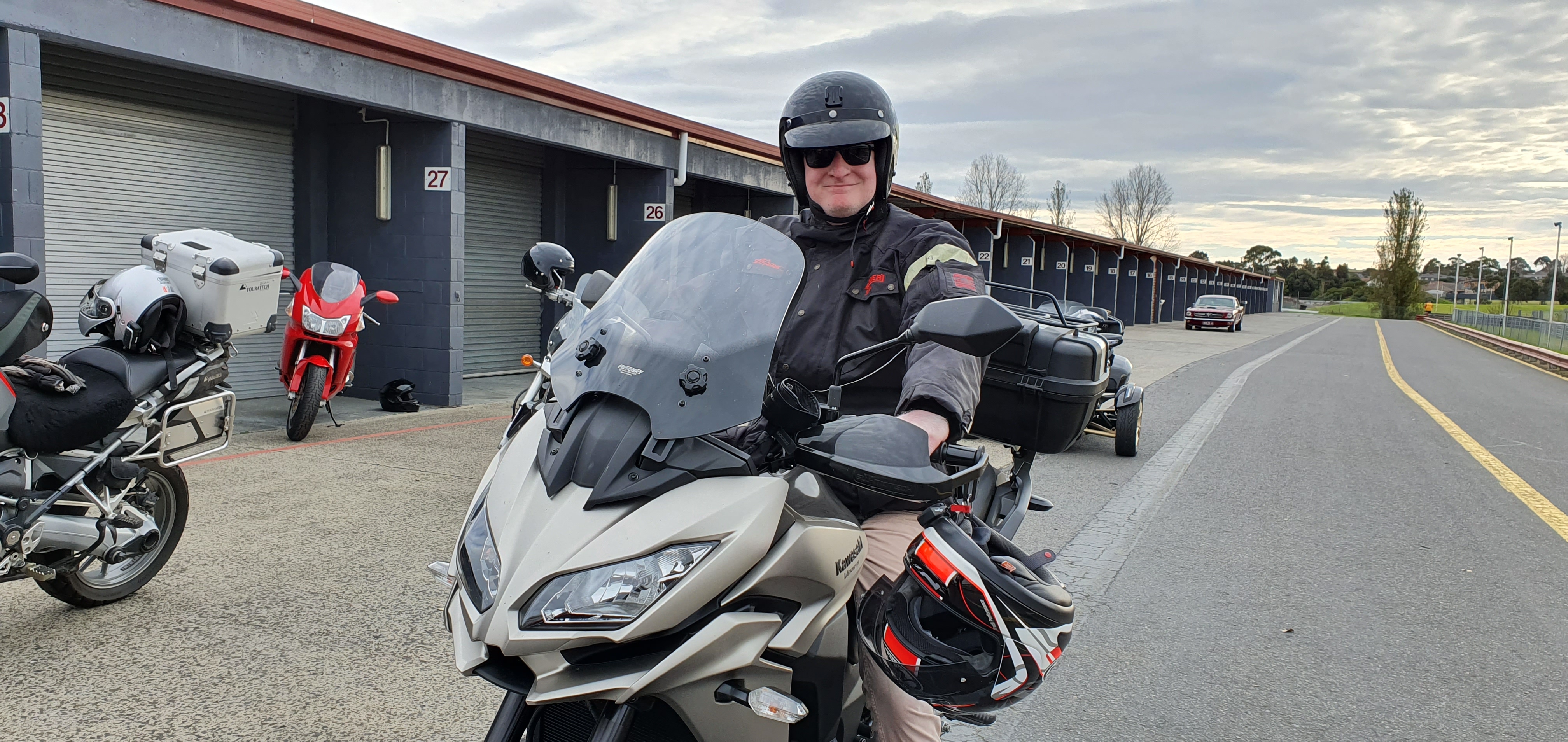 "Myself sitting on a motorbike in full leather and helmet, ready to ride!"