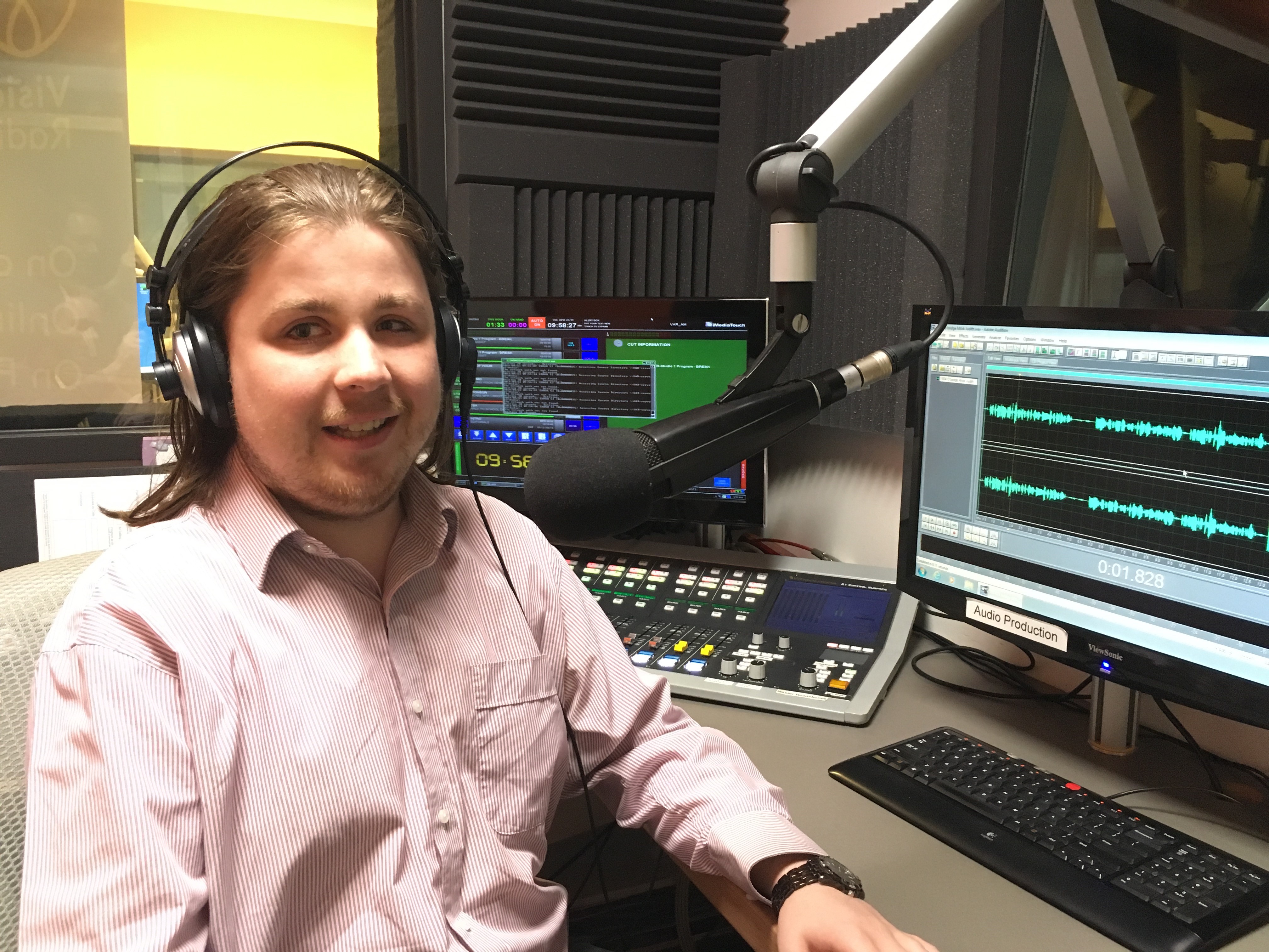 Vision Australia communications and radio graduate Sam Colley in the Vision Australia Radio studios