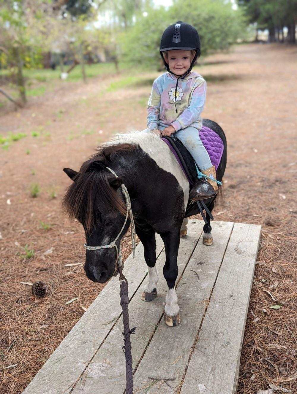 Zarli riding Bobby the horse